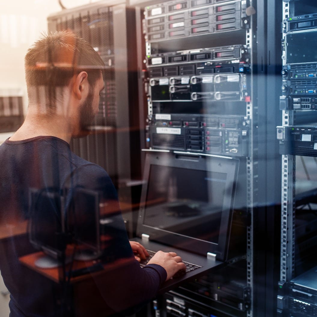 network engineer working in server room